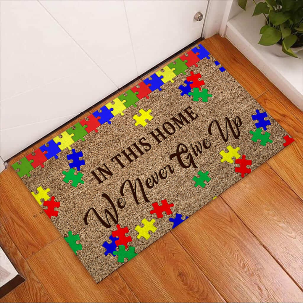 Autism Awareness In this home we never give up doormat – LIMITED EDITION