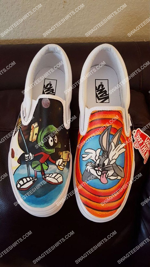 [highest selling] looney tunes cartoons all over print slip on shoes – maria