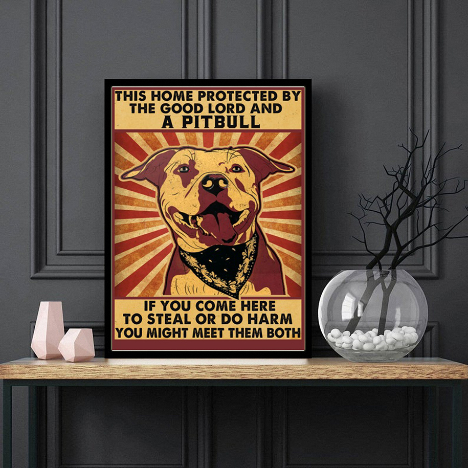 This home protected by the good Lord and a Pitbull poster